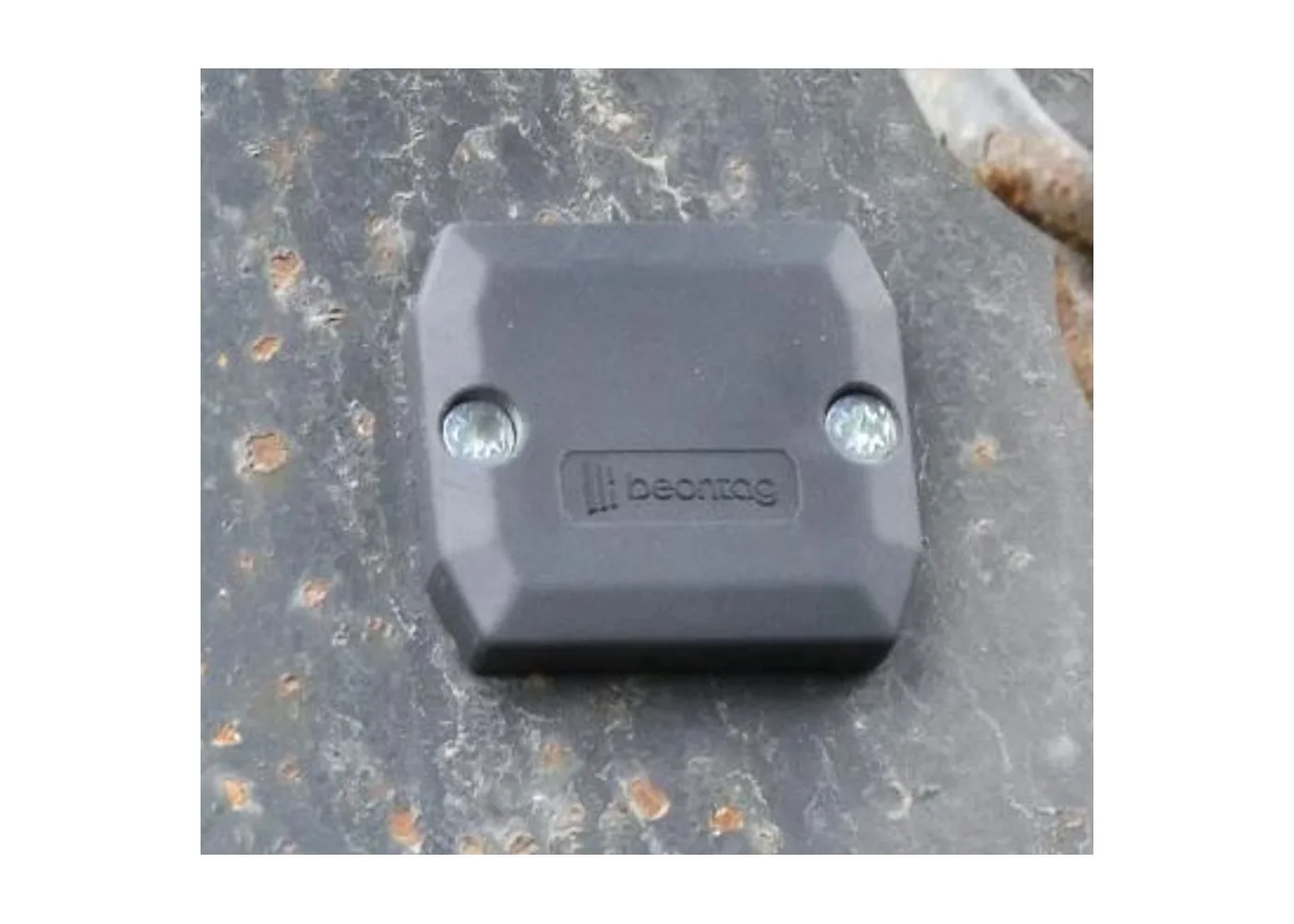 Confidex Ironside Classic RFID hard tag mounted on a metal surface, manufacturer photograph.